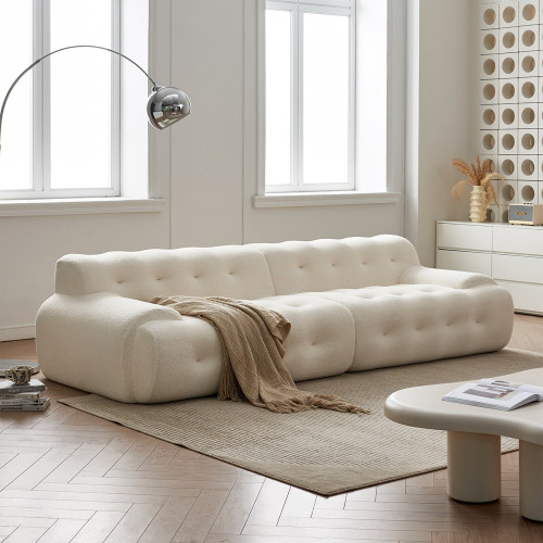 canapé design et confortable en tissu beige livré roulé